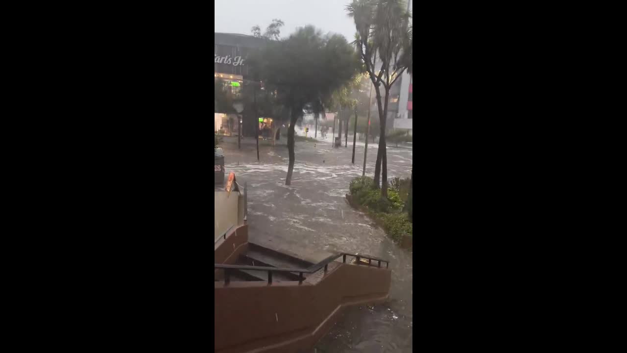 Flash flooding and hail hit streets of Quito