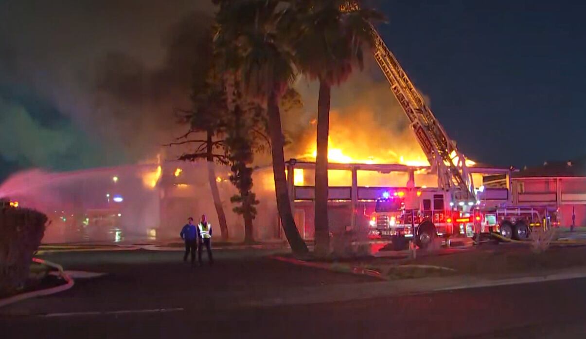 Fire tears through Phoenix motel roof for second time in two months