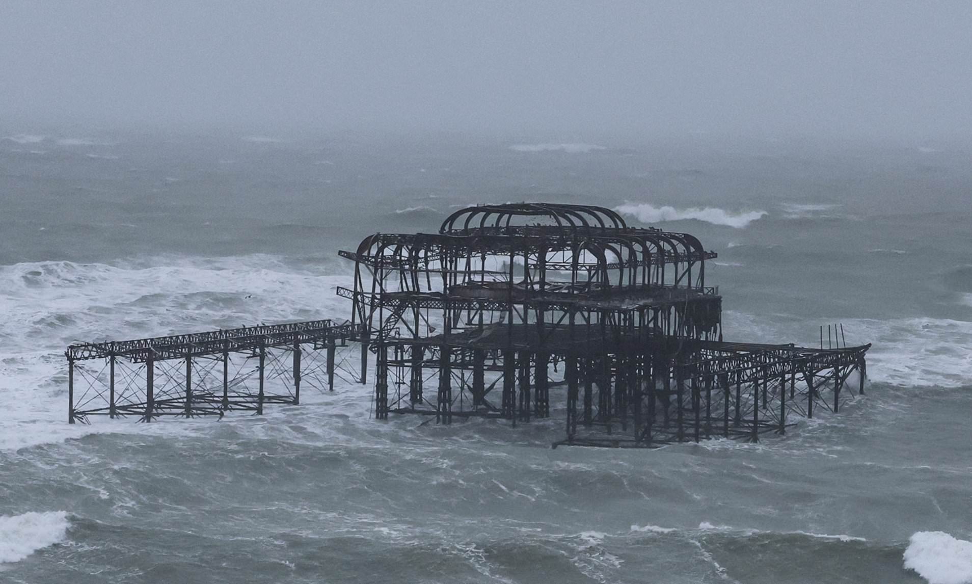 Part of Brighton's West Pier collapses into sea as Storm Austen's 80mph ...