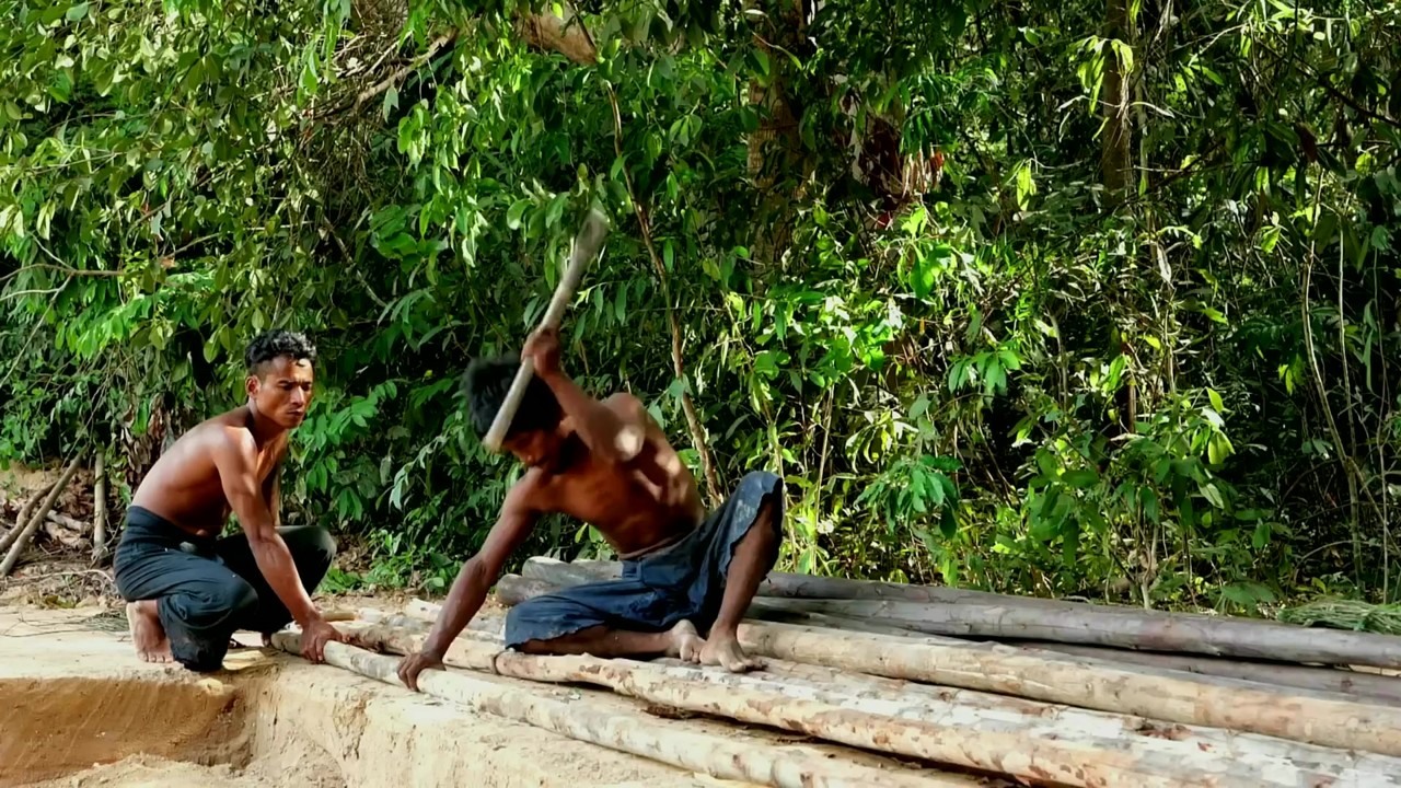 Jungle builders hand-dig an underground villa with a pool
