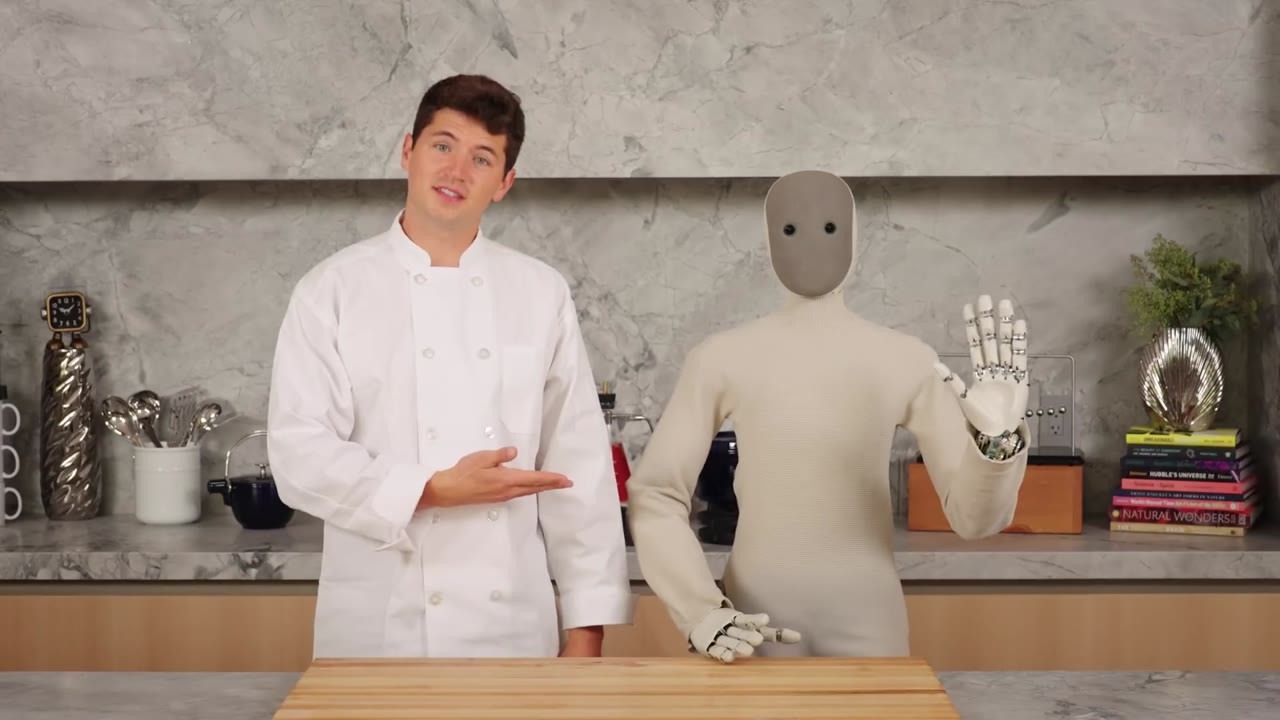 A creator tests a robot’s cooking abilities in a kitchen challenge