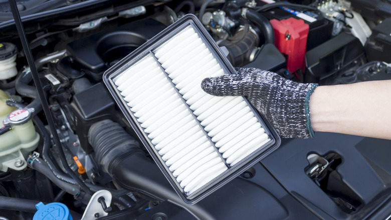 Can you really clean a car air filter, or should you always replace it?