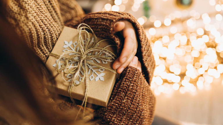 Woman turns a Dollar Tree find into the cutest holiday gift card box