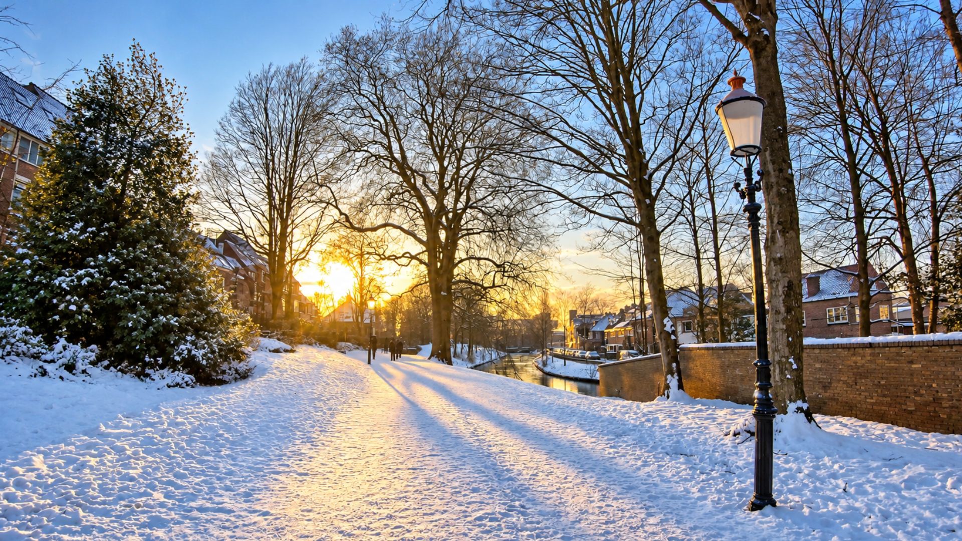 Where snowy canal paths meet golden sunset light in Amersfoort (4K)