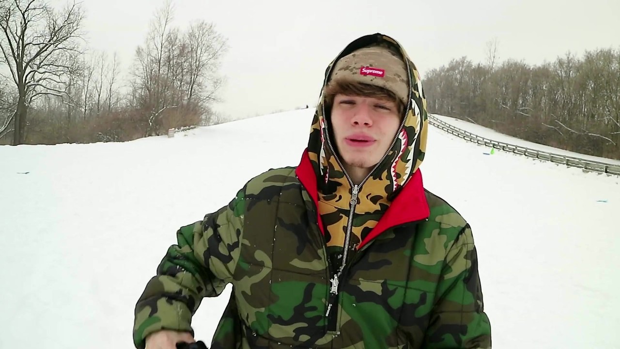 Connor tries snowboarding at Hines Park in Supreme and Bape gear