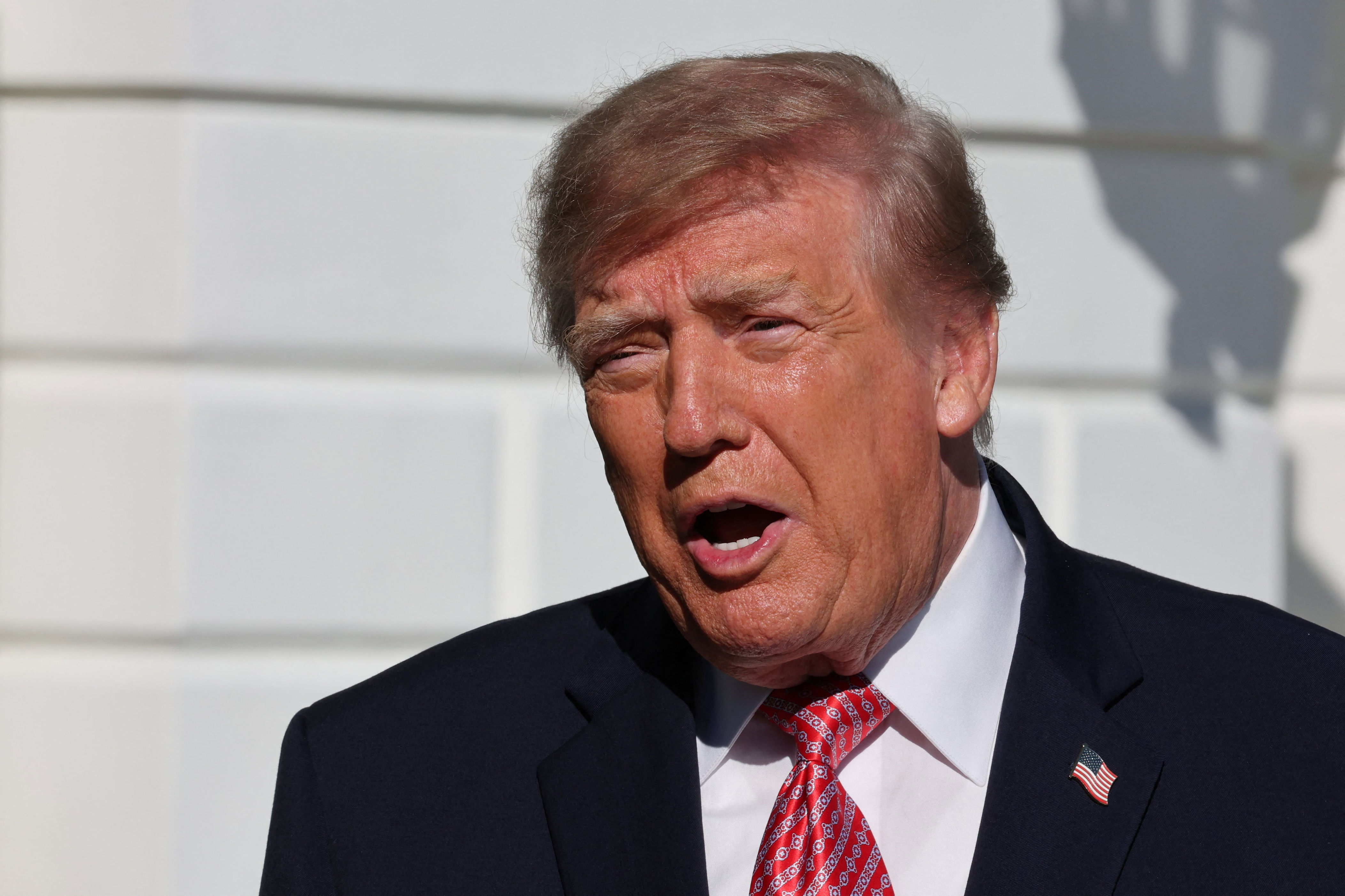 Trump displays wild hair after latest makeover