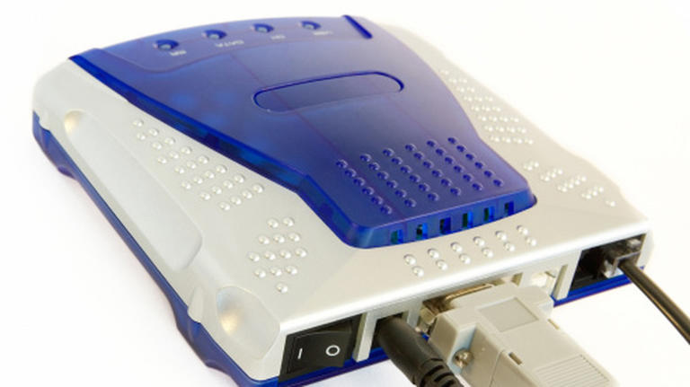 How long did it take to download 100 MB on a 56K modem?
