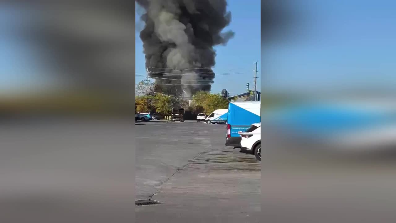 Huge black smoke plume rises from Kingston scrap metal yard fire