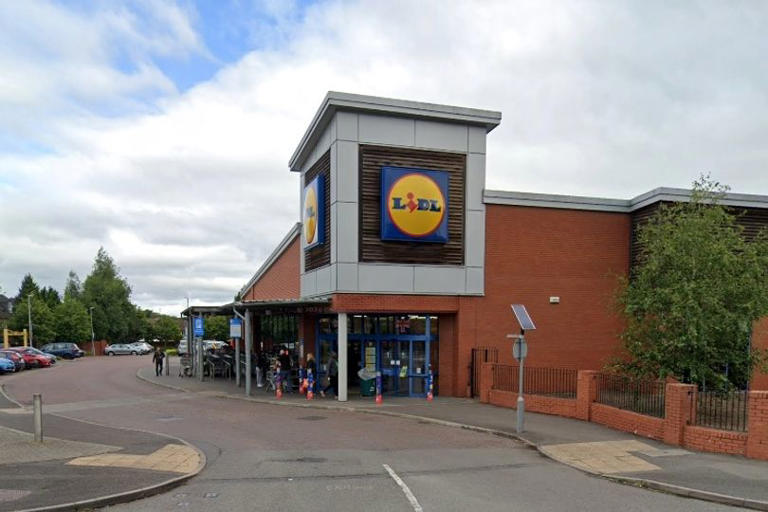 Man dies and several treated after car crashes into Lidl store