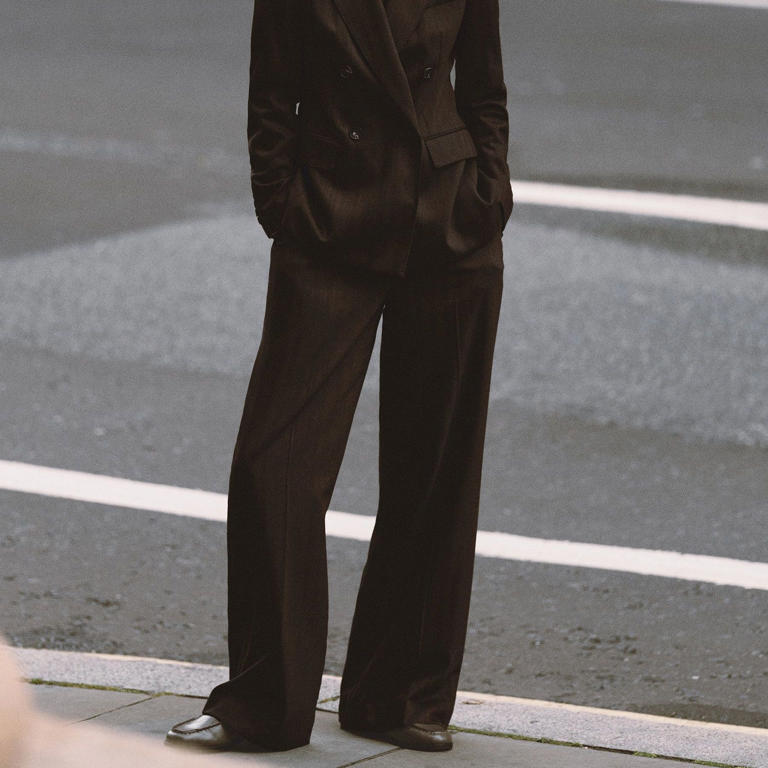 Claudia Winkleman has me convinced – a chocolate brown trouser suit is ...