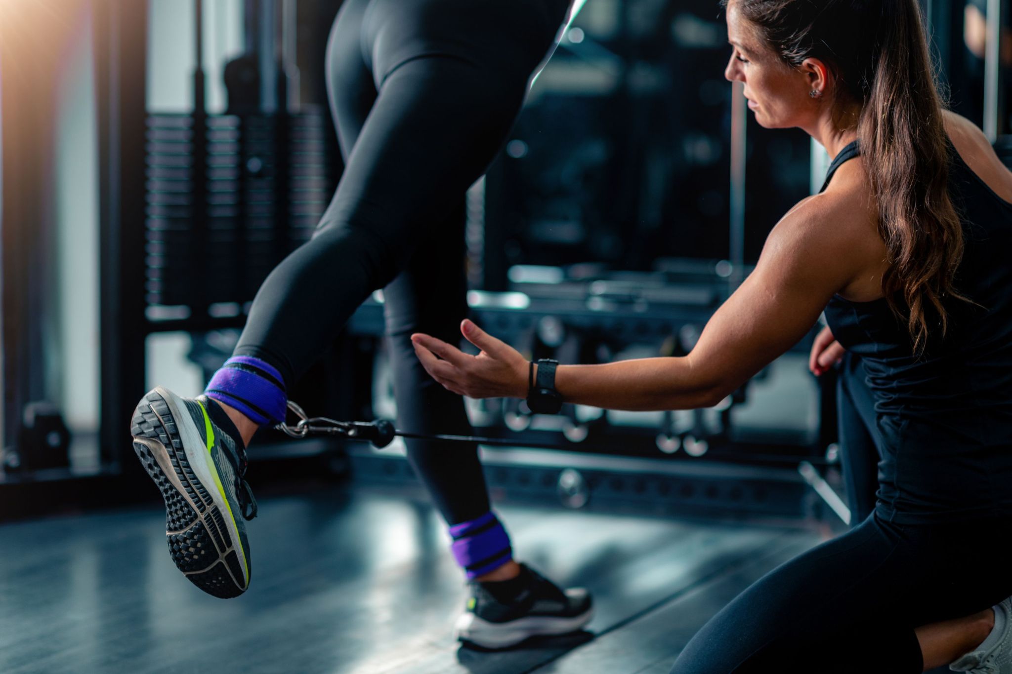 Woman at gym with personal trainer gets interrupted—then stranger goes further