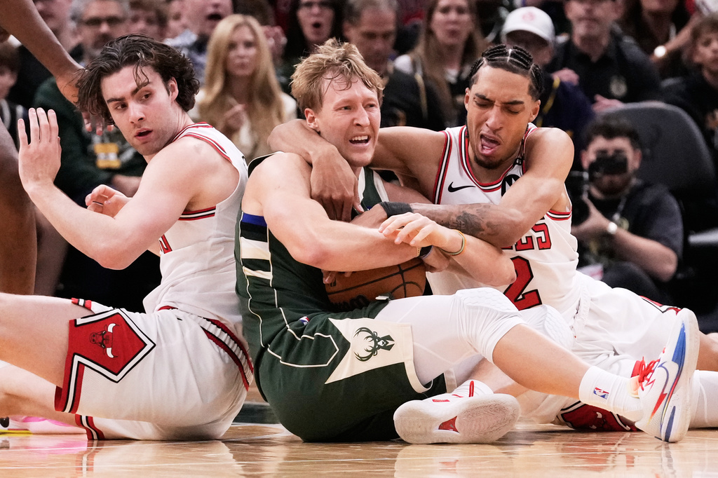 Powell scores 25 points to help the Bulls hold off the Bucks, 132-125