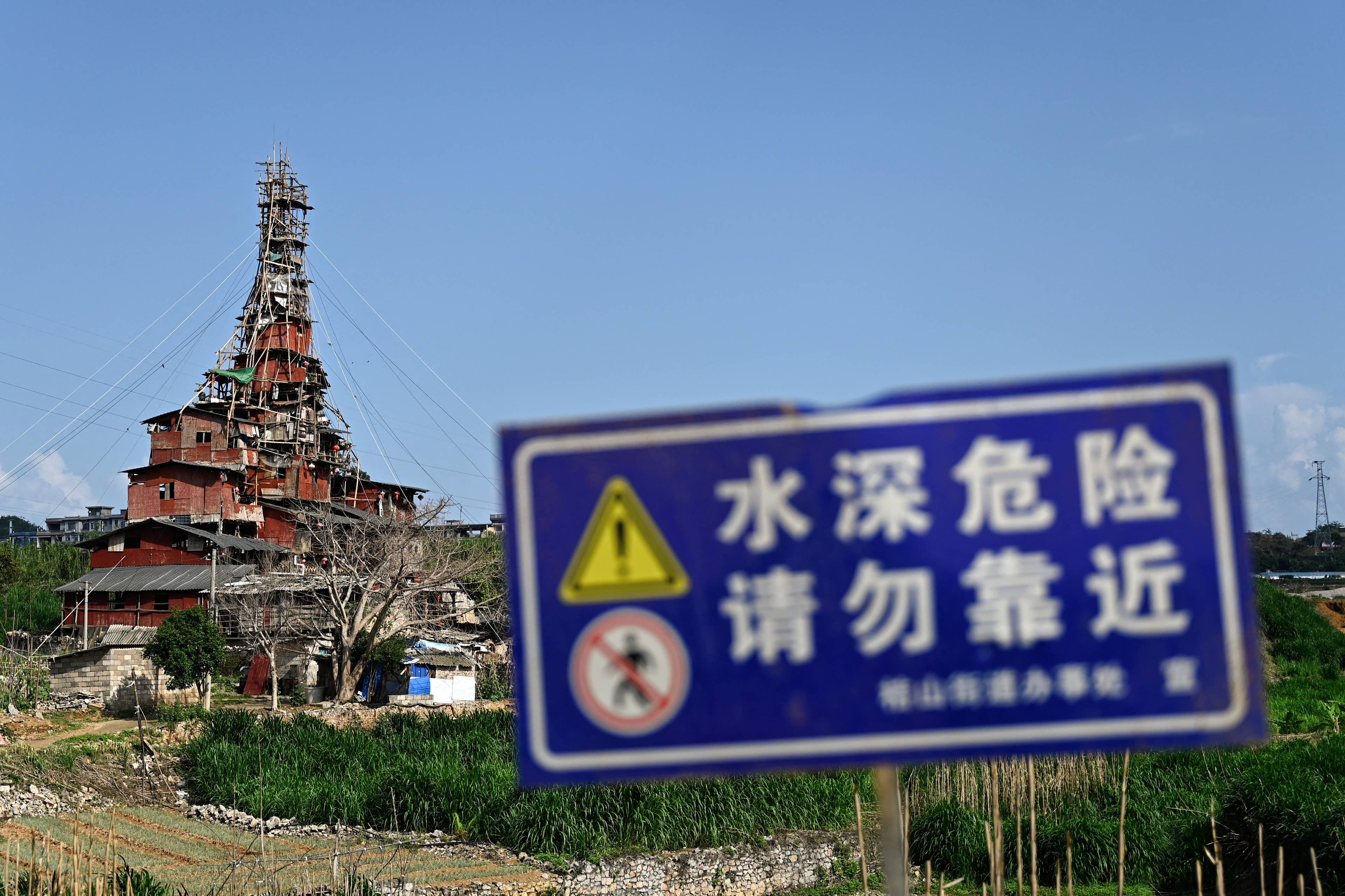 Duck farmer's house defies demolition for over a year on Chinese highway