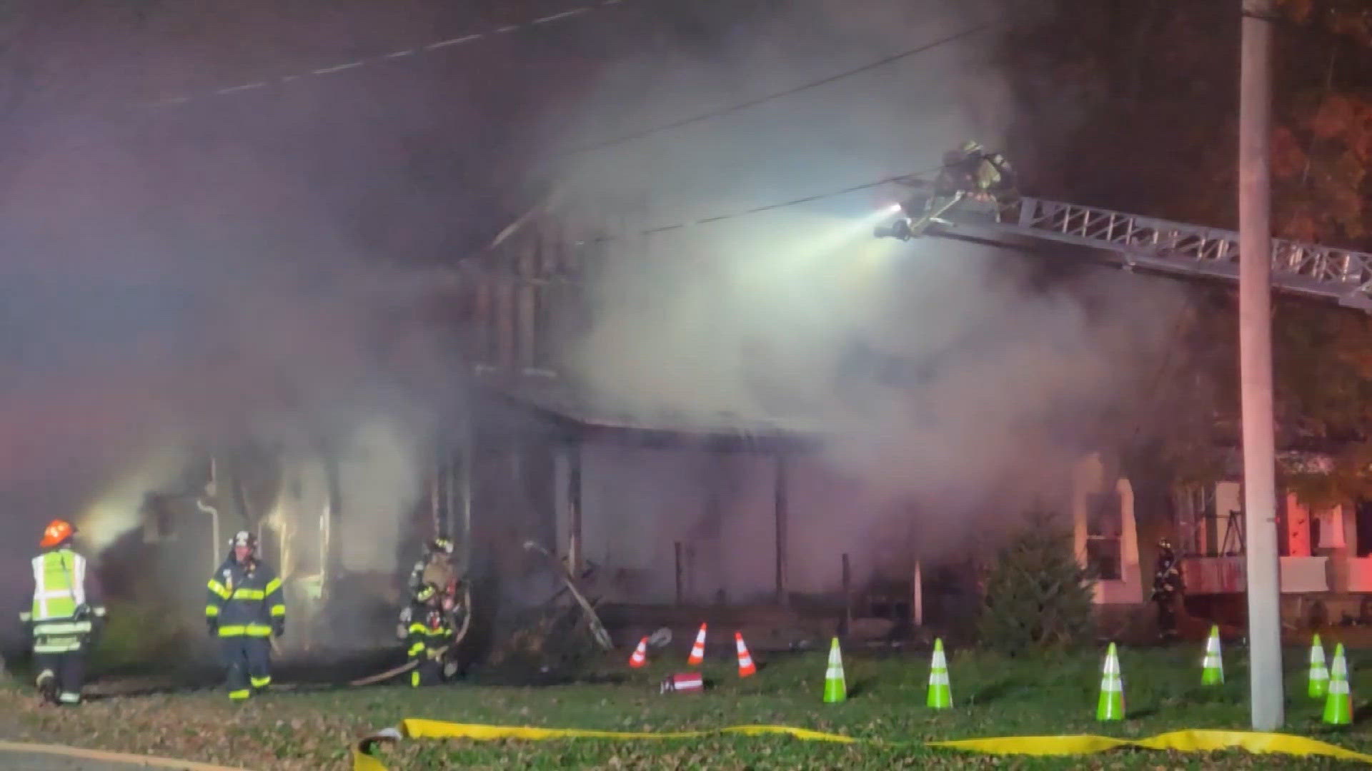 Neighbor hurt trying to rescue resident from deadly fire