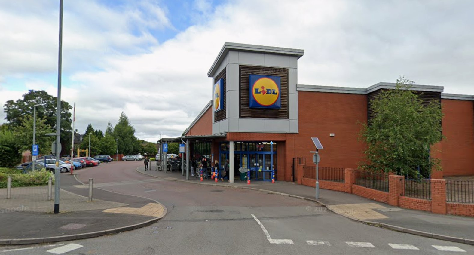 Man dies after car crashes into front of busy Lidl