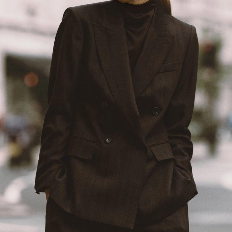 Claudia Winkleman has me convinced – a chocolate brown trouser suit is ...