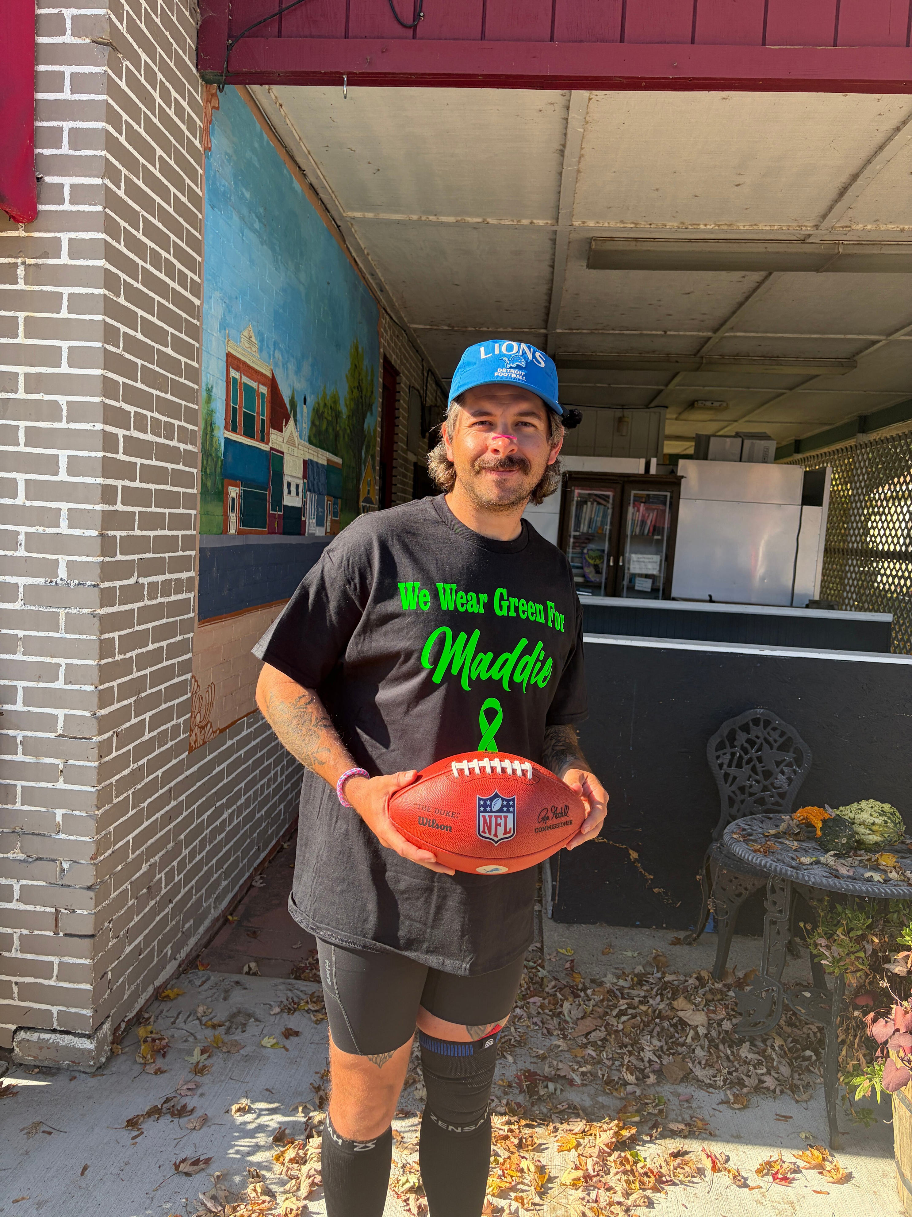 Flushing man honors teen during 313-mile run to Ford Field