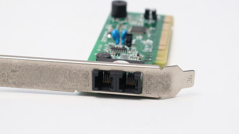 How long did it take to download 100 MB on a 56K modem?