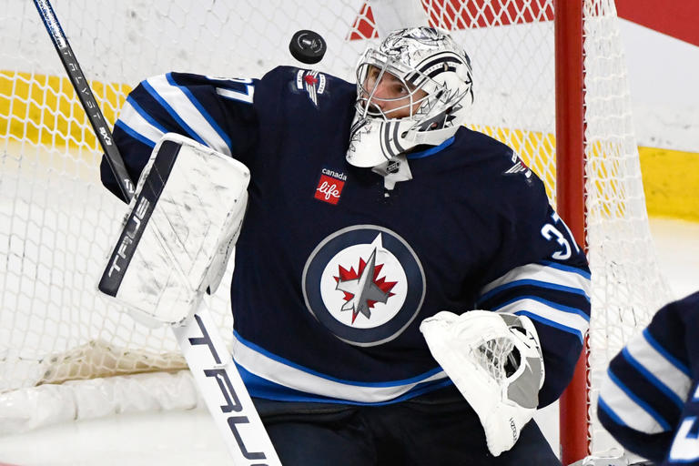 Devils acquire US Olympic goalie Connor Hellebuyck in a trade with the Jets