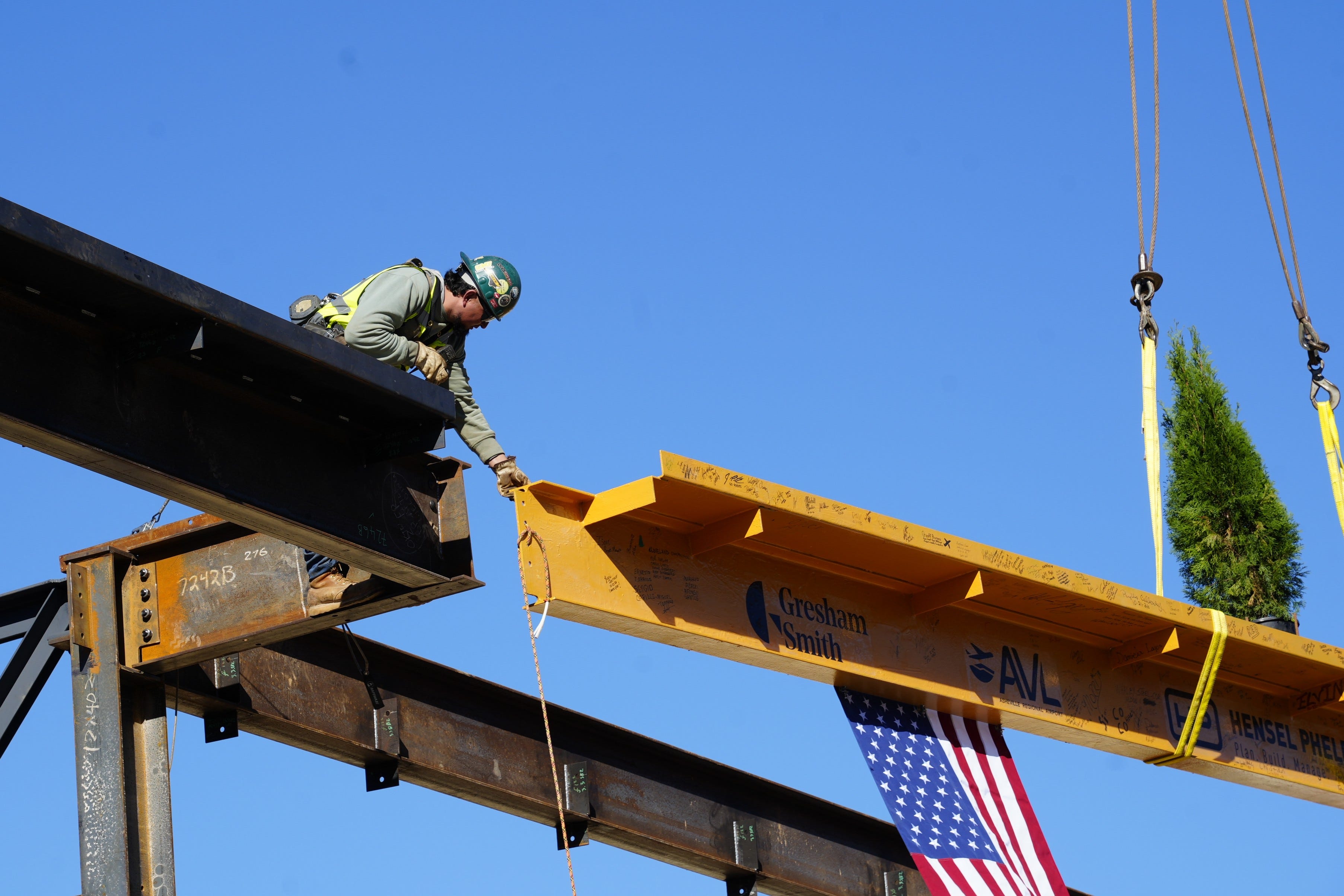 Final steel beam in place at rebuilt Asheville airport terminal