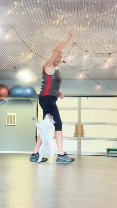 Pug performs incredible tricks with woman