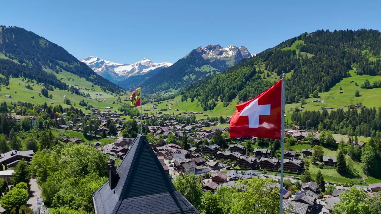 Gstaad, Switzerland: Drone soars above a charming alpine village