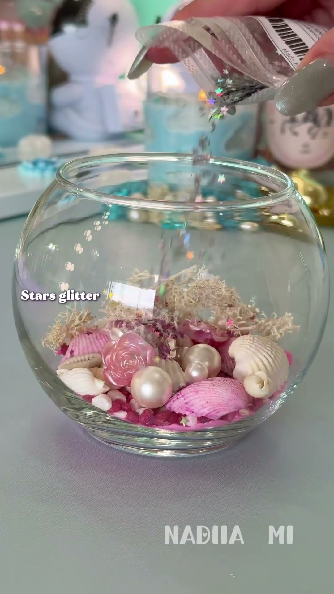 Pink water candle with seashells 🌸 so satisfying