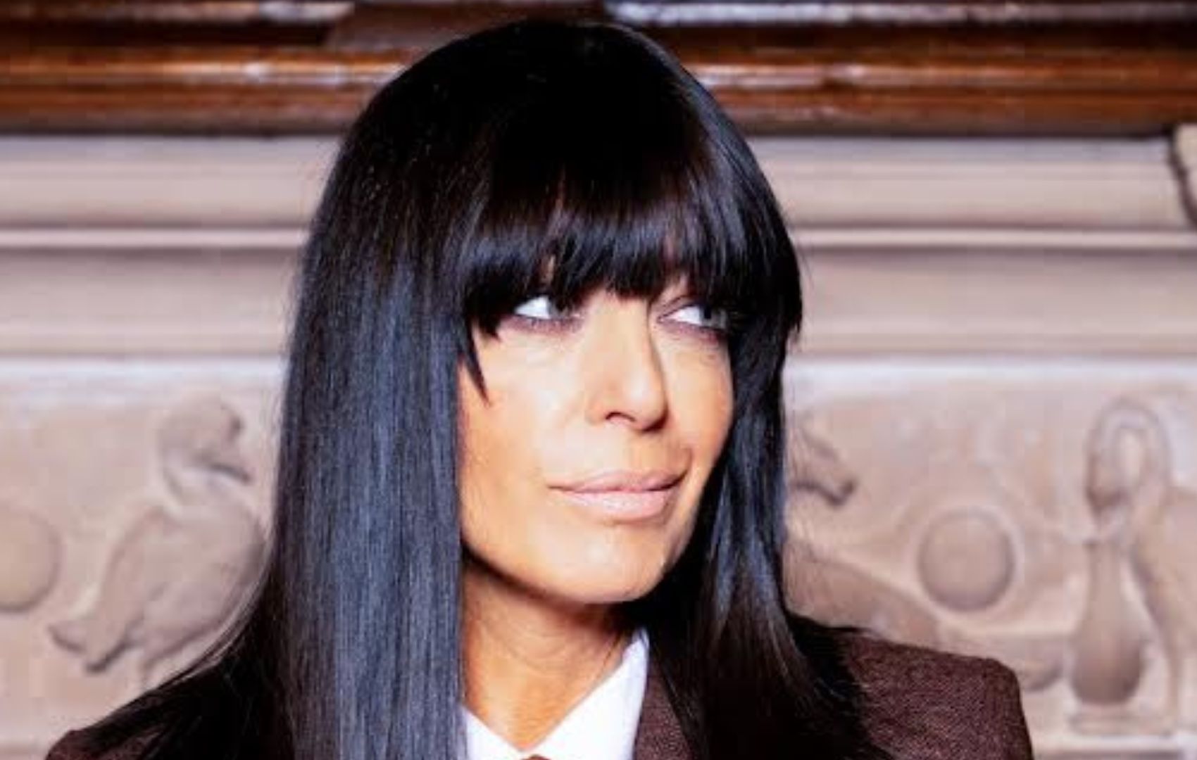 Claudia Winkleman has me convinced – a chocolate brown trouser suit is ...