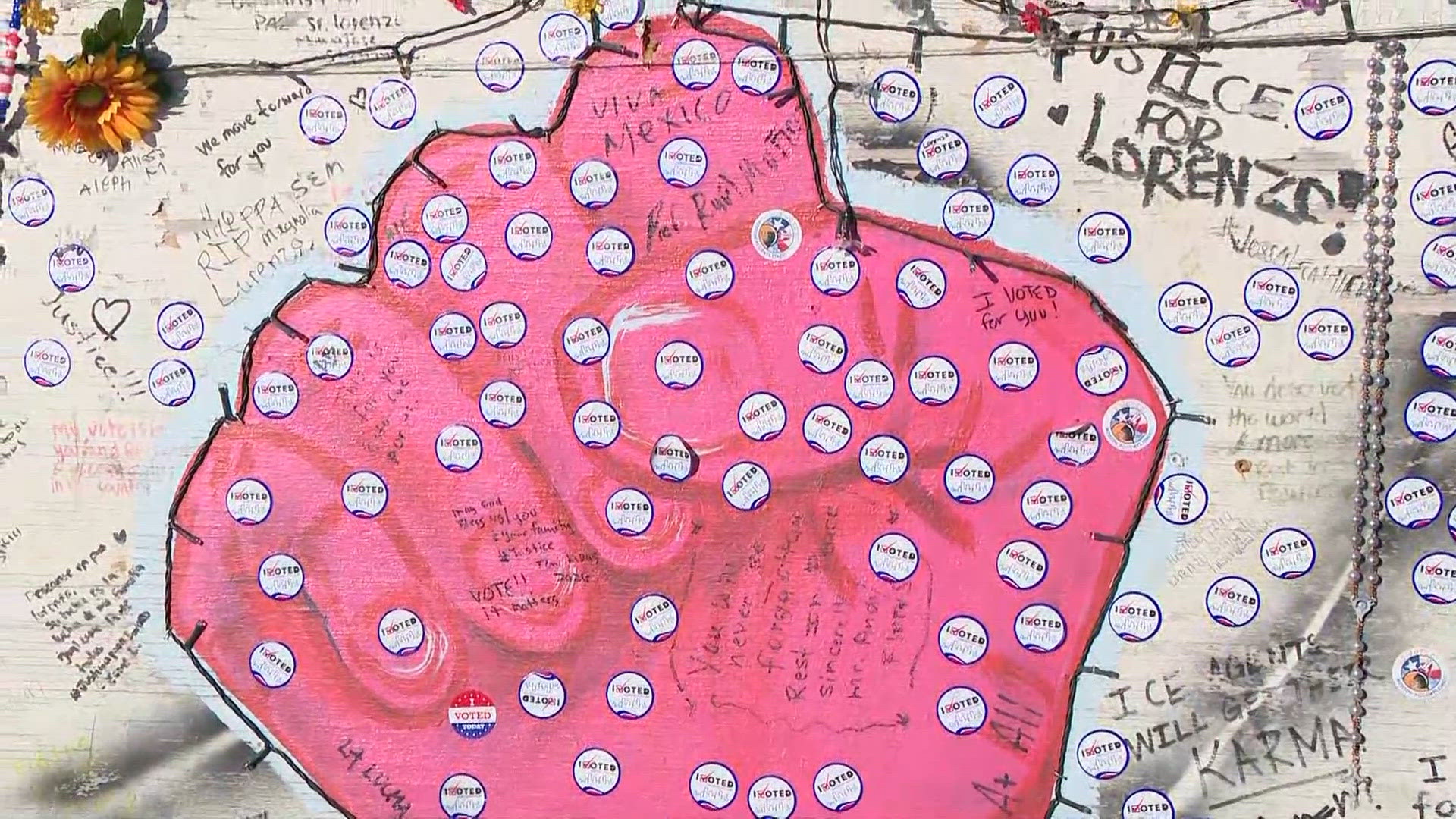 'I voted' stickers cover Lorenzo Salgado's memorial in Houston's East End