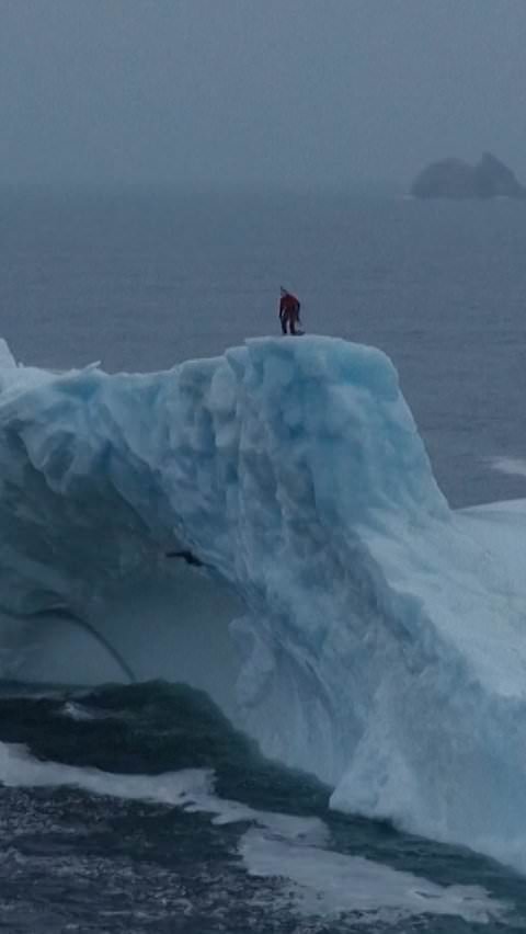 Molly Carlson becomes first woman to cliff dive from an iceberg