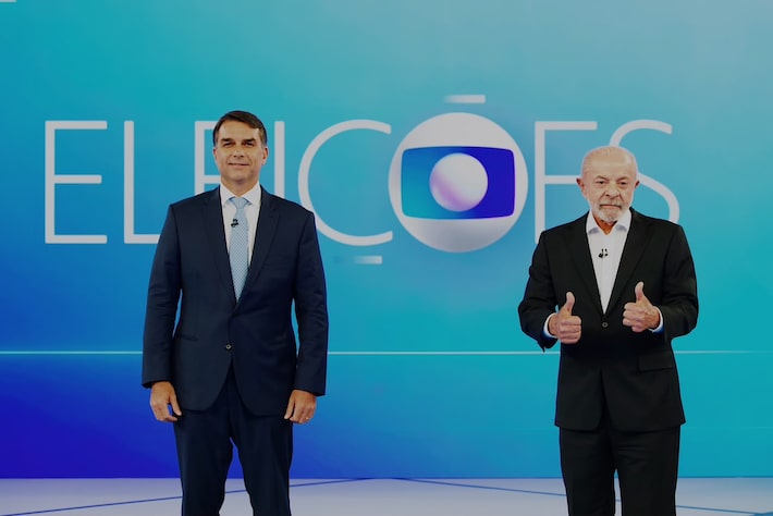 Flávio Bolsonaro (PL) e Lula (PT) no último debate das eleições 2026 Foto: Reprodução/TV Globo