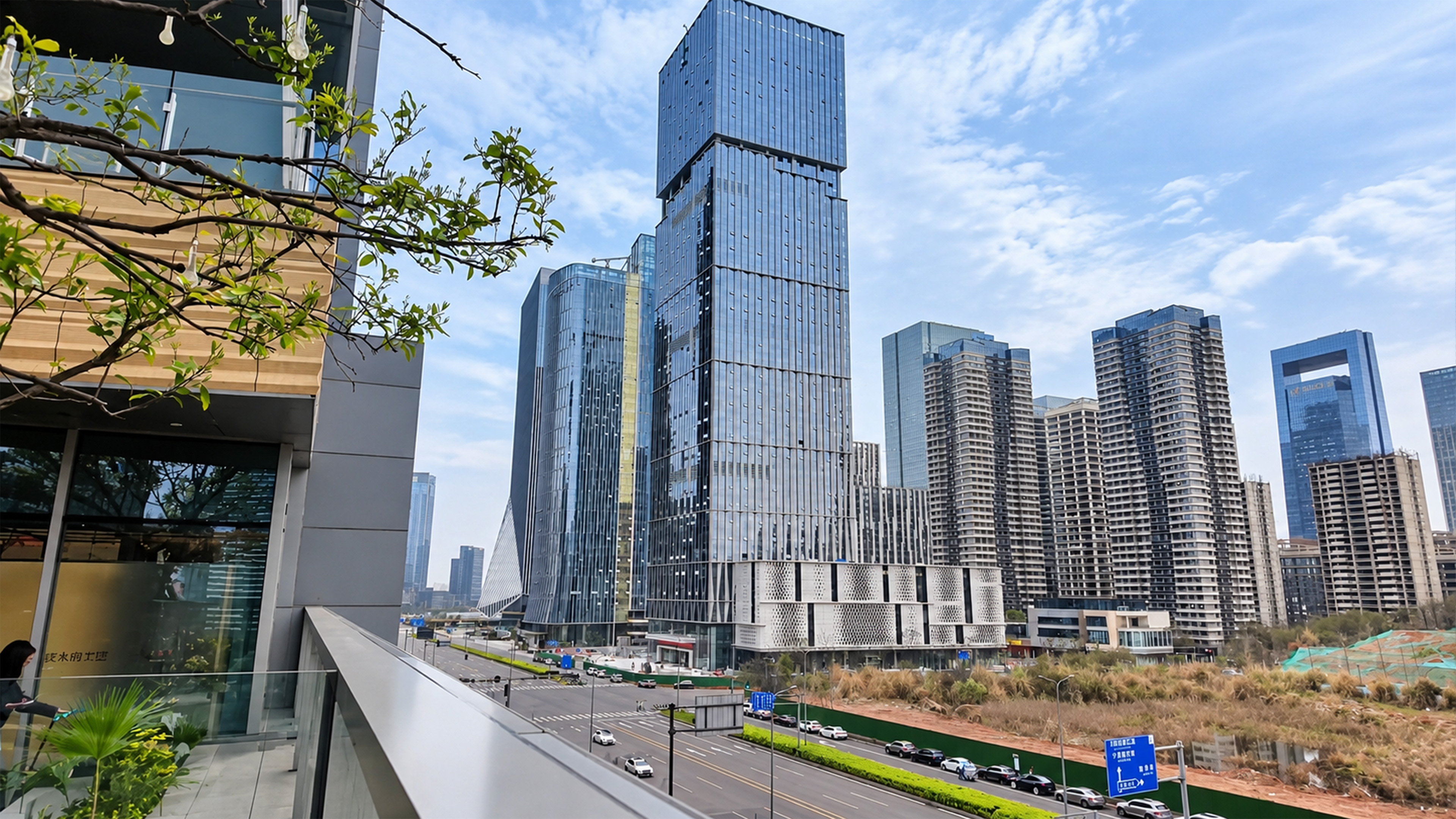 Chengdu's unusual glass tower stands beside rows of giant apartments