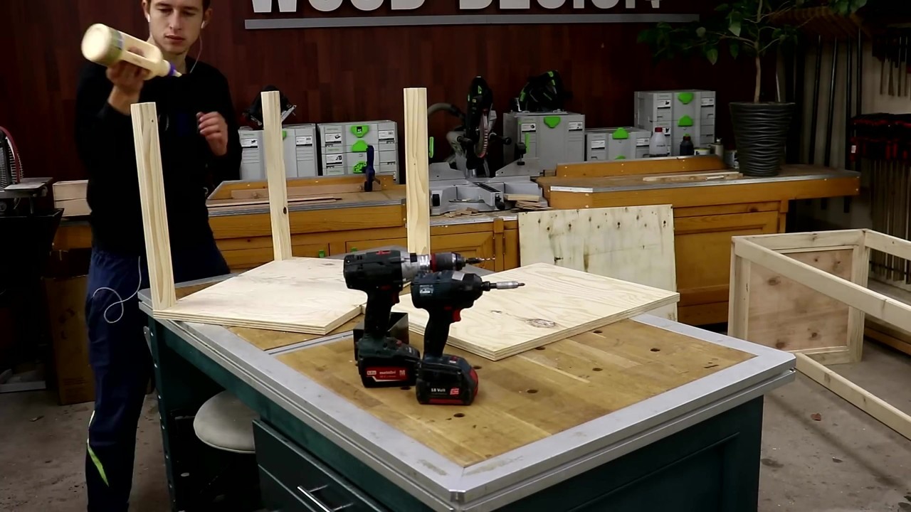 A woodworker builds a DIY workshop project