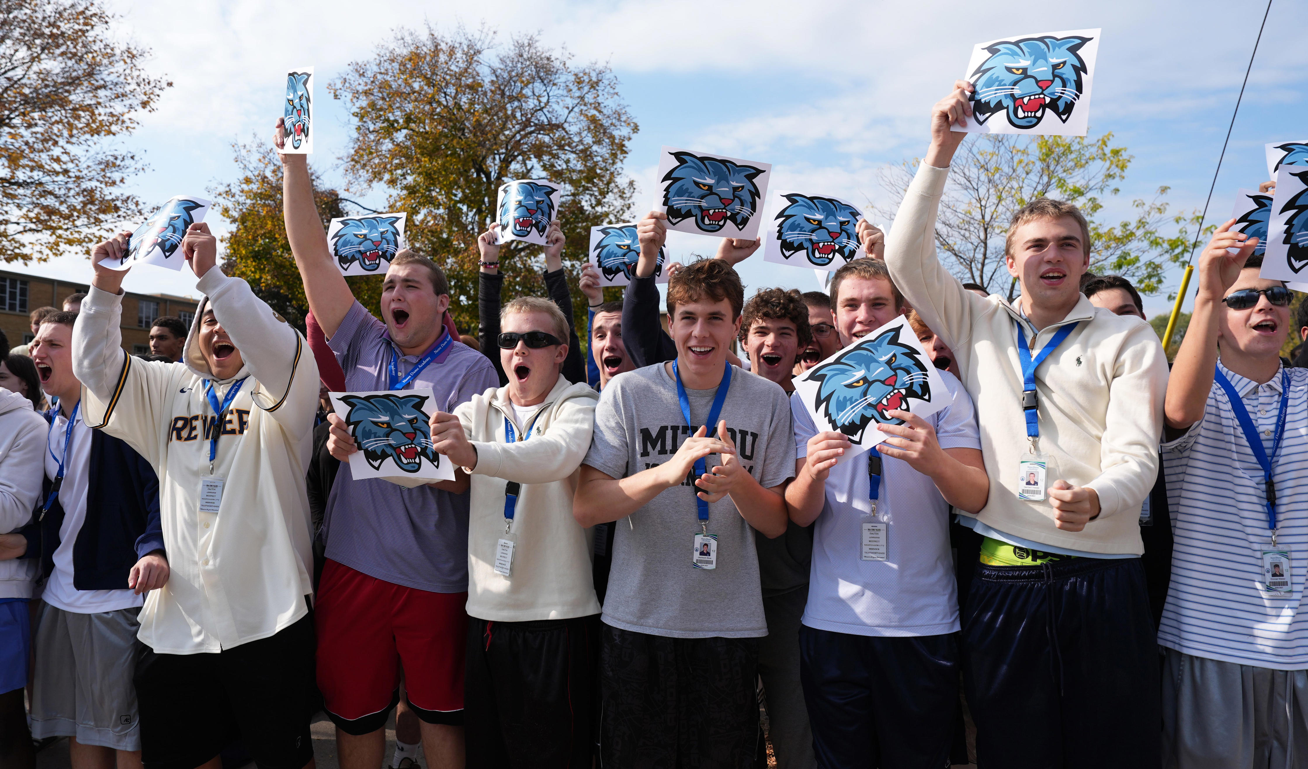 Green Bay Notre Dame cheers West football team on the way to game