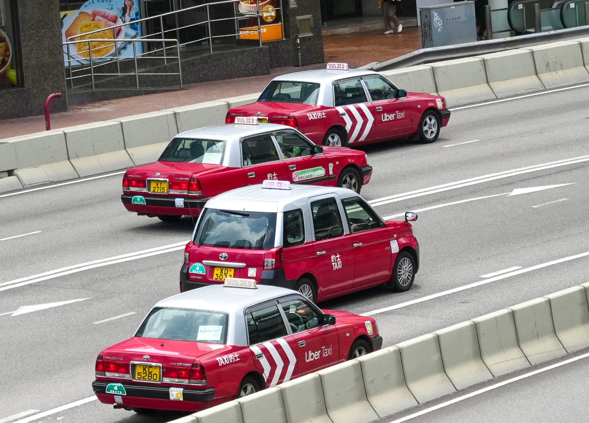 16,000 sign up for exam to drive taxis or ride-hailing cars in Hong Kong