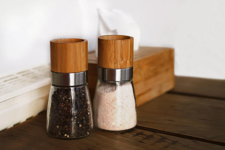 Salt and pepper shakers have different numbers of holes and almost ...