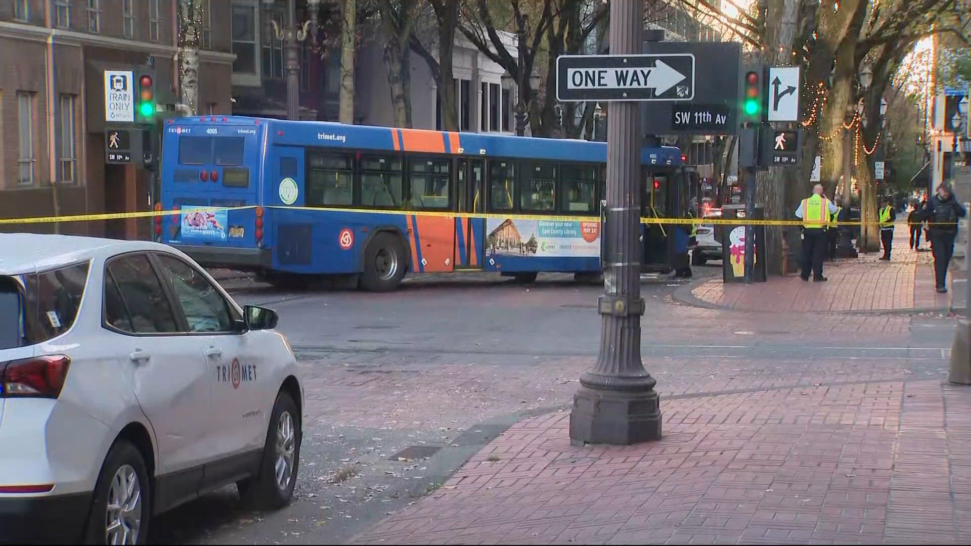Pedestrian hospitalized after being hit and pinned under TriMet bus