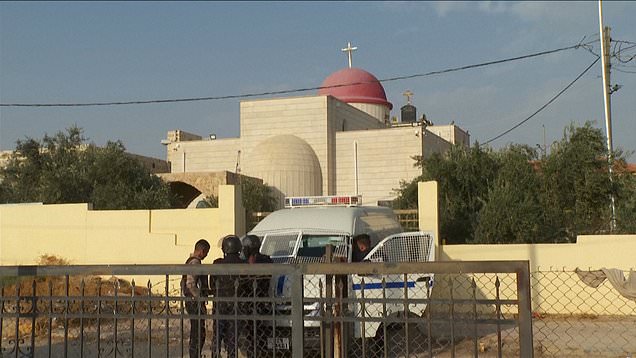Police partol outside Greek Orthodox Church after gunman opened fire
