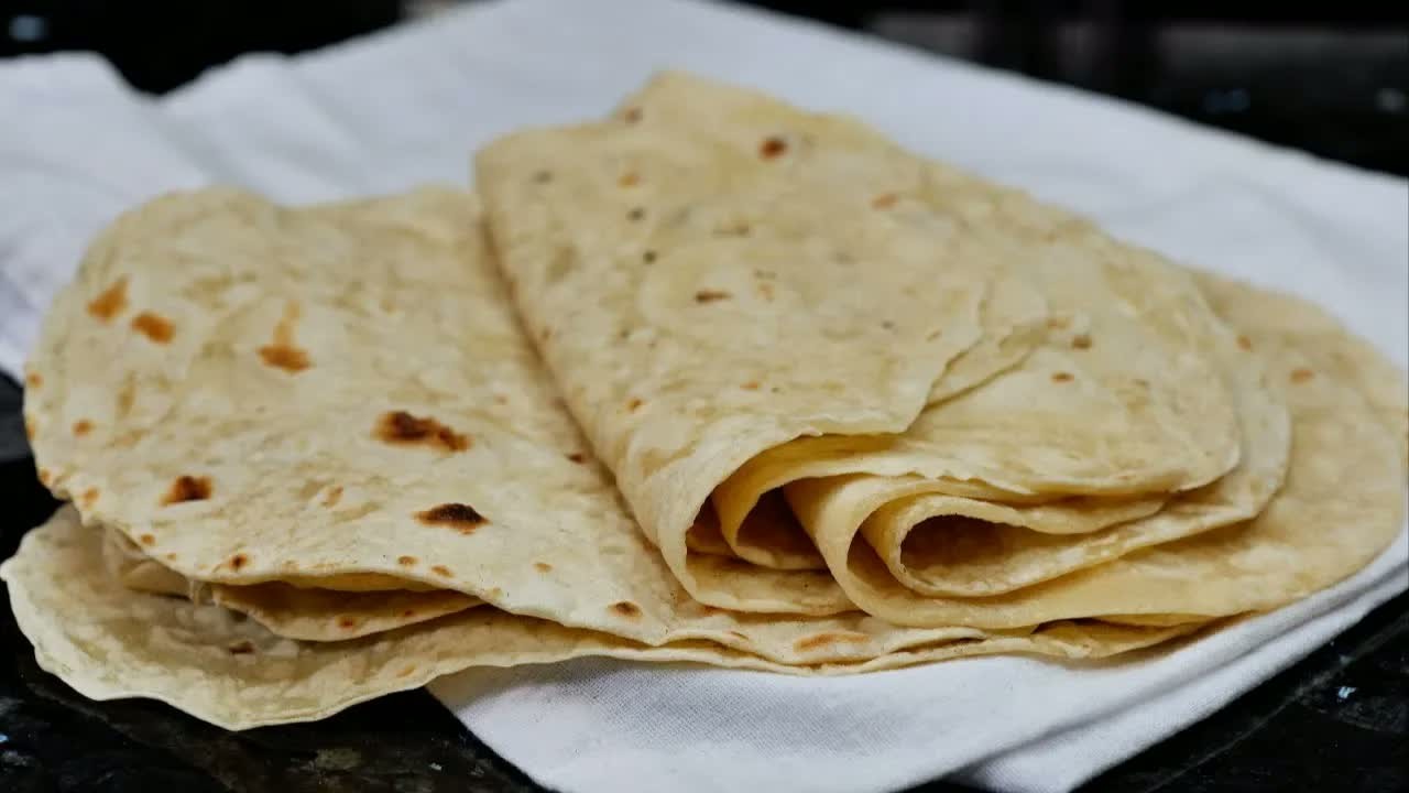 One dozen four-ingredient flour tortillas from scratch