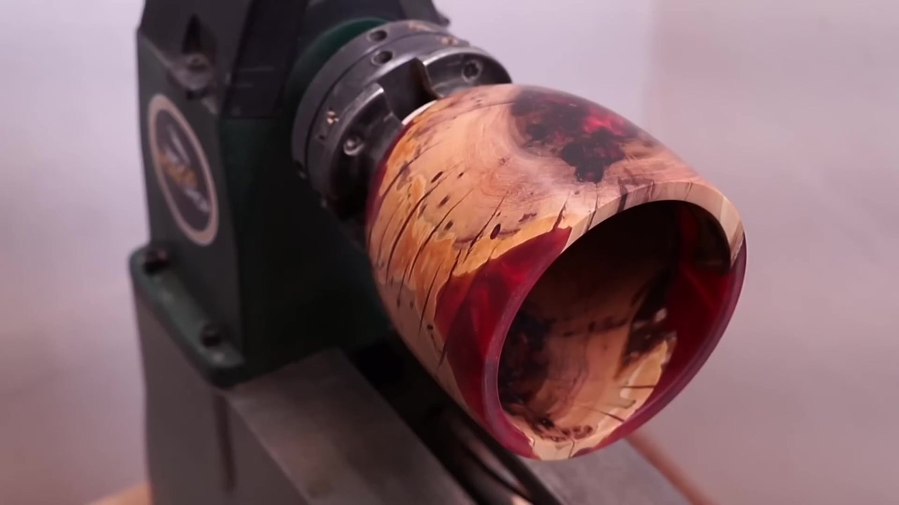 Hollow apple wood bowl with translucent red resin