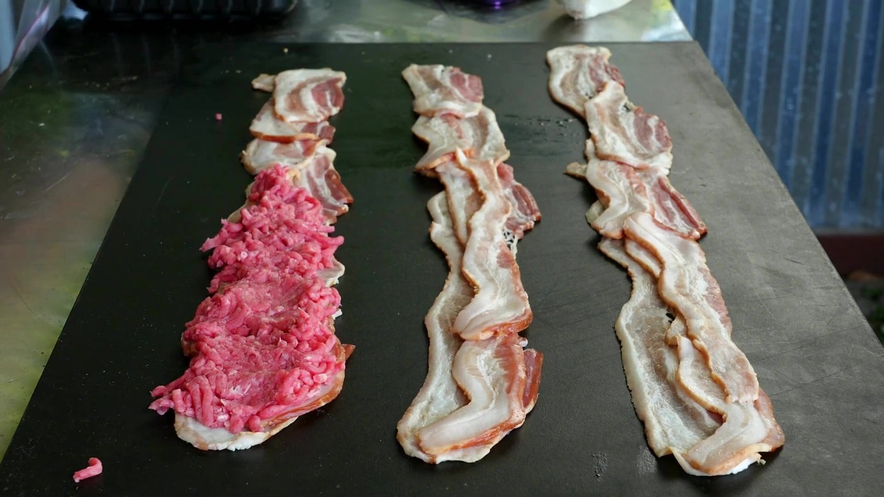 Pinwheel bacon burger cooked on a Black Earth grill