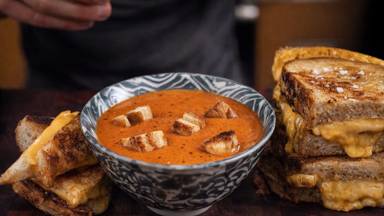 Creamy tomato soup with sourdough grilled cheese croutons