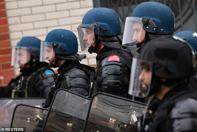 French riot police hit far-left mobs with water cannon as protests ...