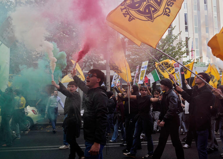 Soldiers sent to Milan as thousands of protesters march across European ...