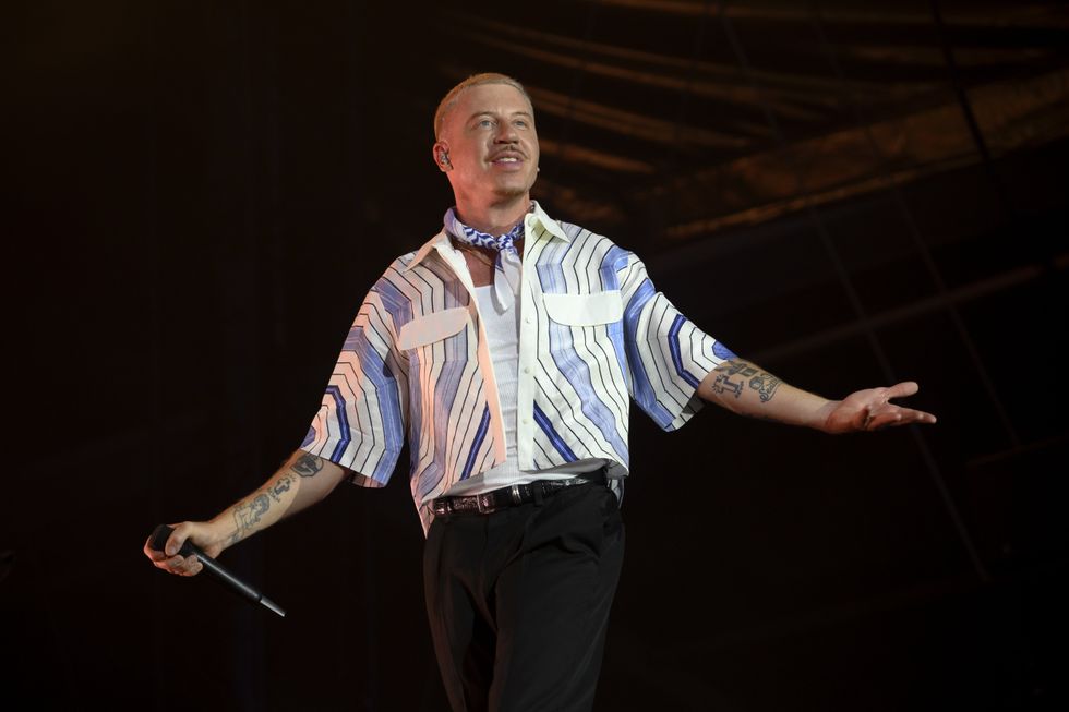 Macklemore faces call for UK ban before gig supporting group that ...
