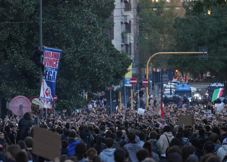 Soldiers sent to Milan as thousands of protesters march across European ...