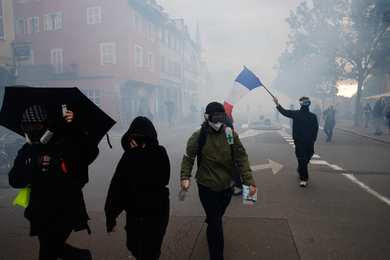 More than 400,000 protest across France, challenging Macron as Paris ...