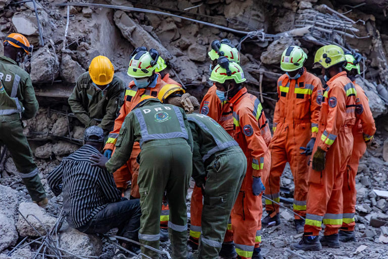 Rescue workers search for missing after Nairobi building collapse