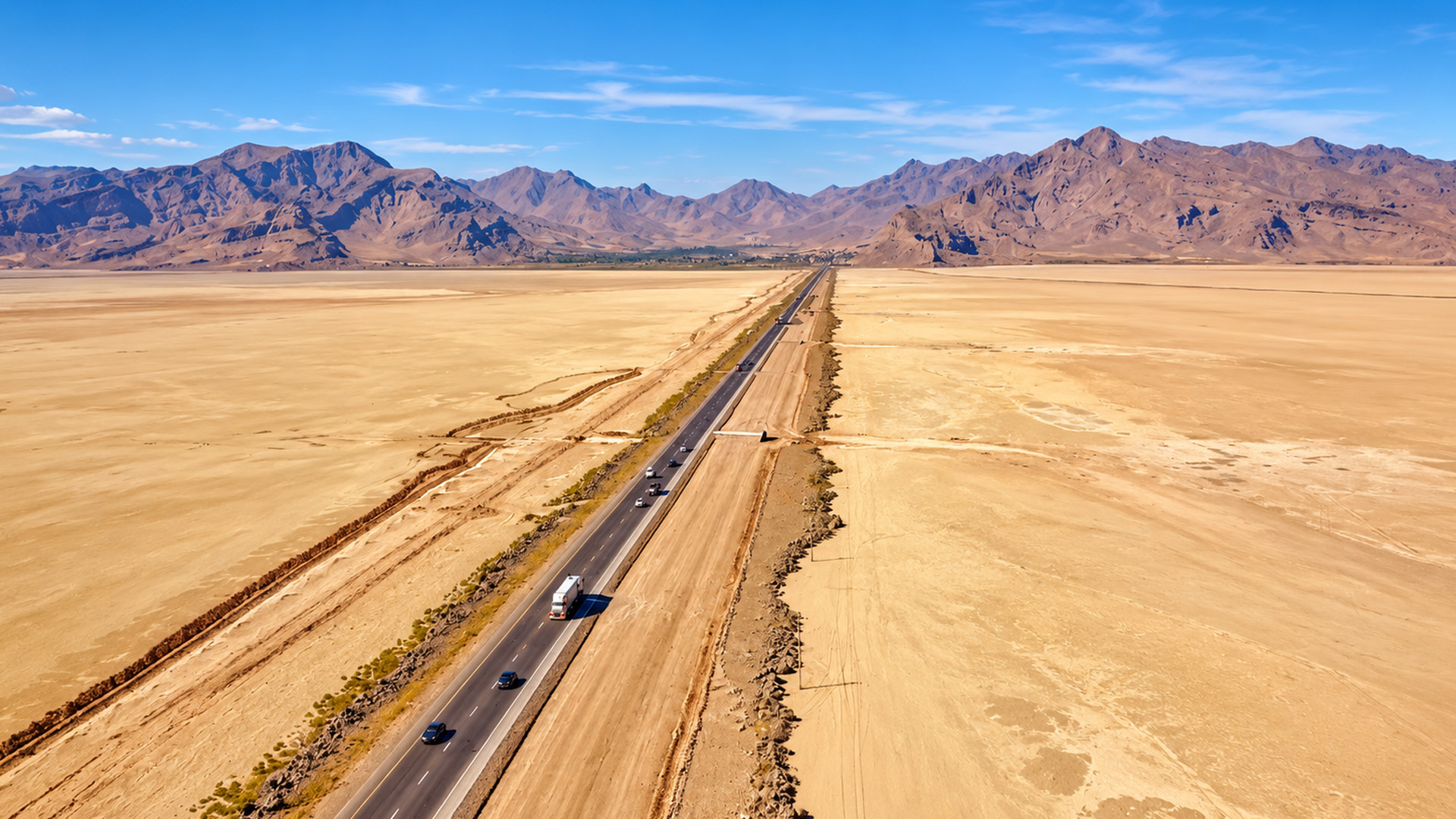 How far does this road cross Iran's desert?