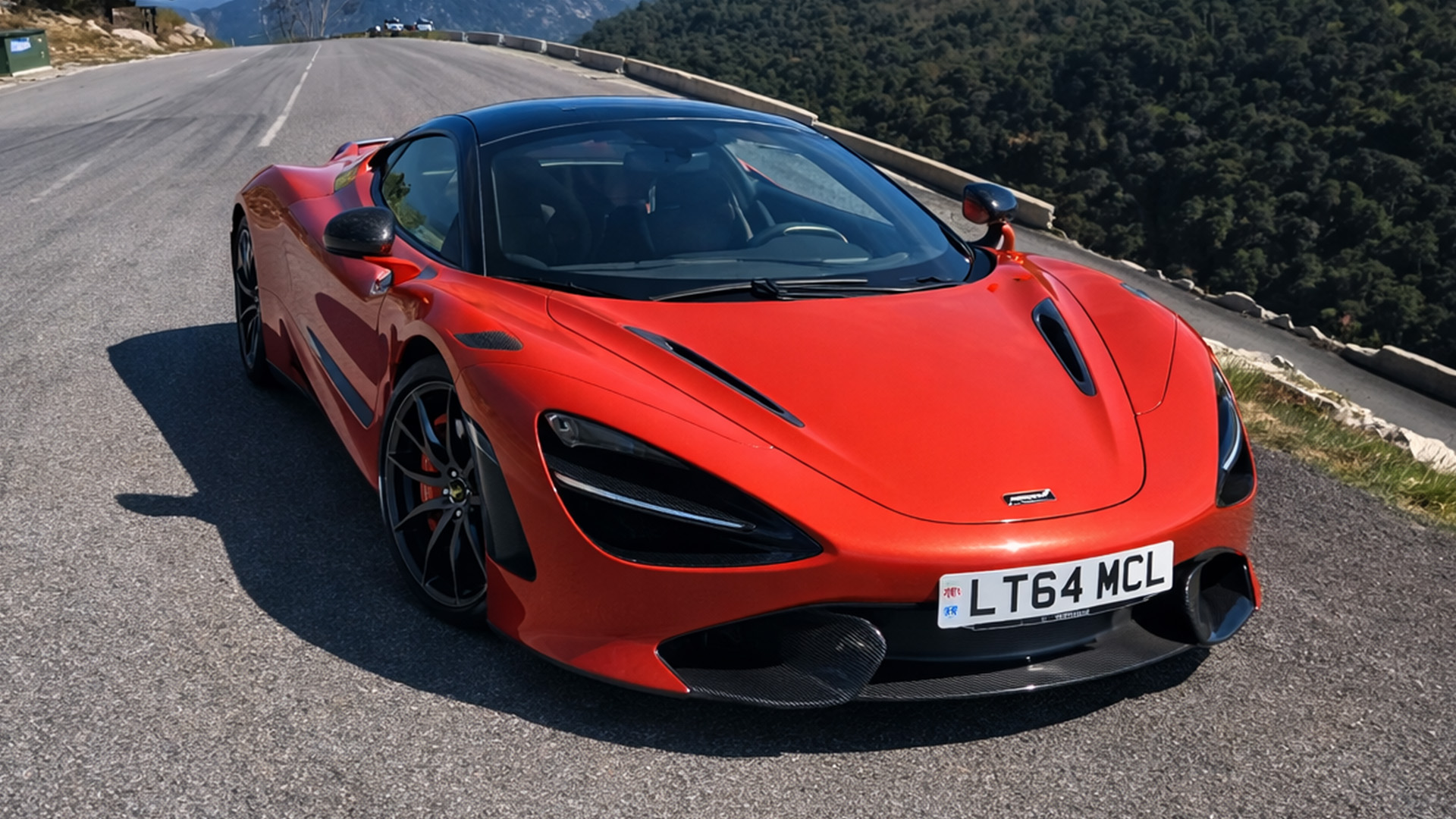 The McLaren 765LT Spider roars into action as it hits the road